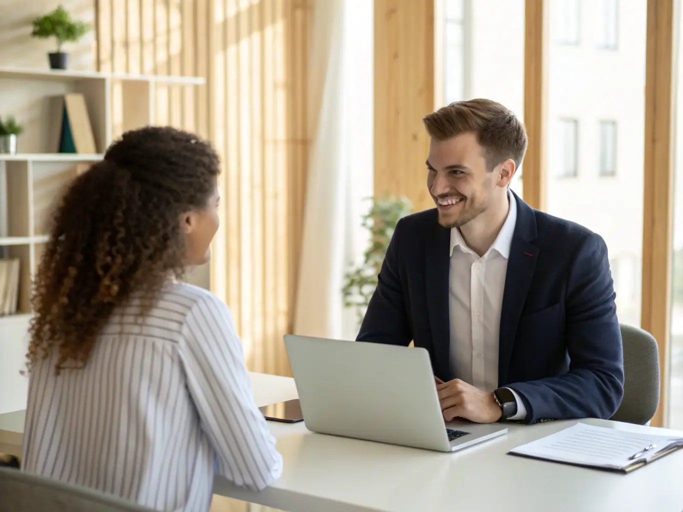 A professional setting with recruiters interviewing candidates, emphasizing the access to skilled talent that Levitate Solutions provides to employers.
